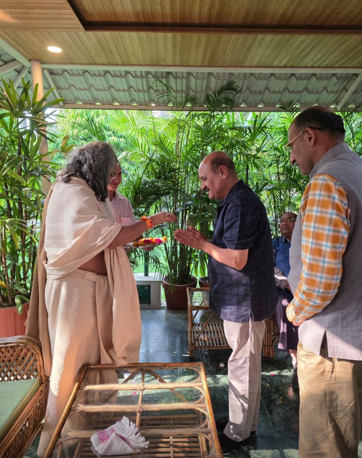 Flowers offered to a guest at the ashram