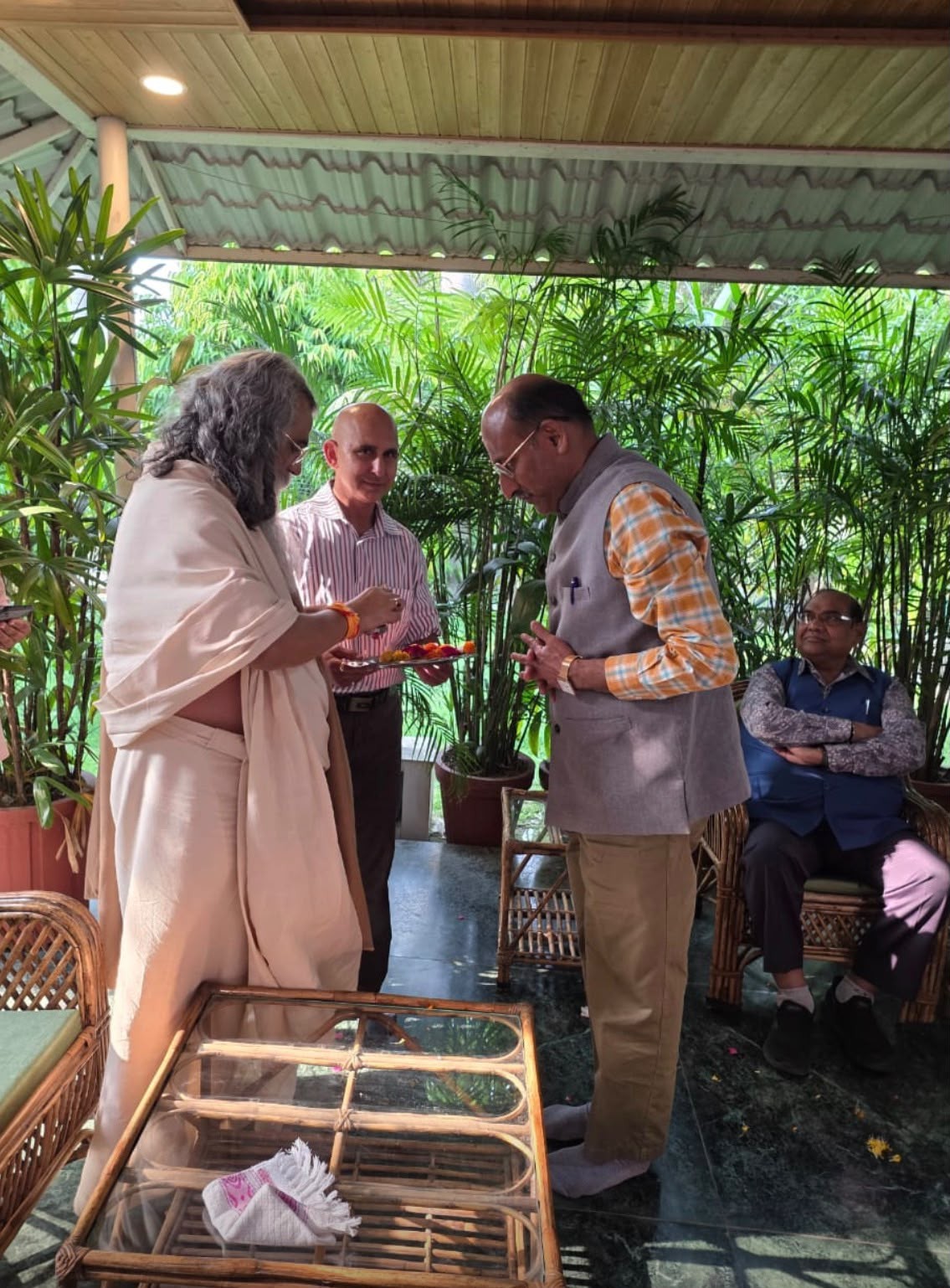Prasad offered to a visiting guest
