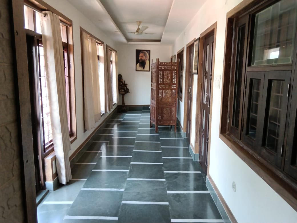 The inner corridor with the Guru's portrait